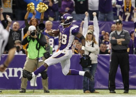 Adrian Peterson striding into the endzone.