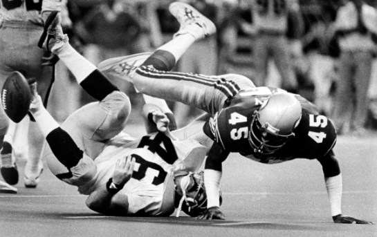 Kenny Easley rocks former Raider TE Todd Christensen