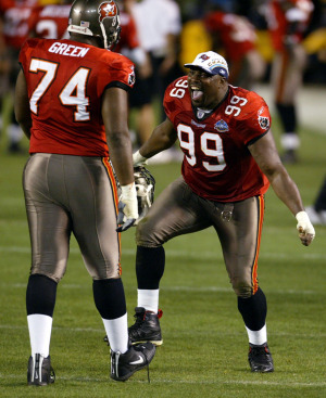 Sapp was a larger than life defensive tackle that Tony Dungy built his defense around. Pictured here celebrating in Super Bowl XXXVII.