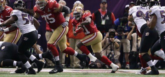 Frank Gore running a sweep during Super Bowl XLVII. He will have to abide by the new rule that mandates thigh and knee pads this year.