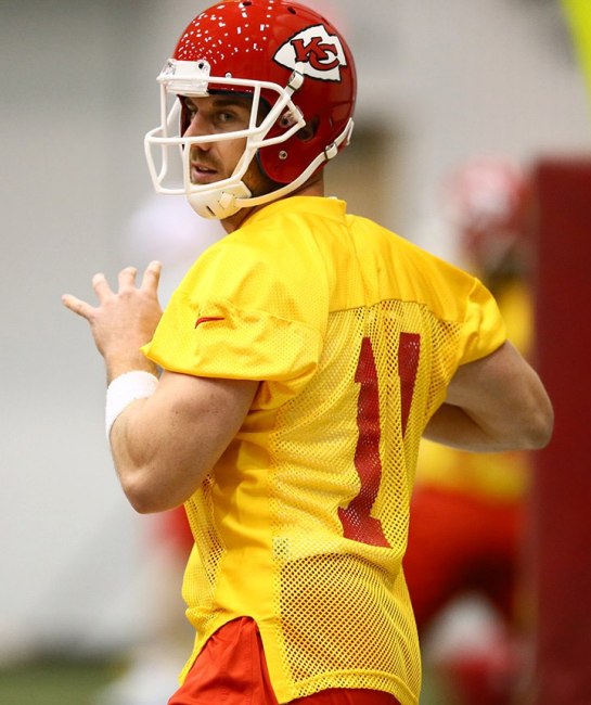 Alex Smith for the first time in his career doesn't have to look over his shoulder. The Chiefs are committed to him.