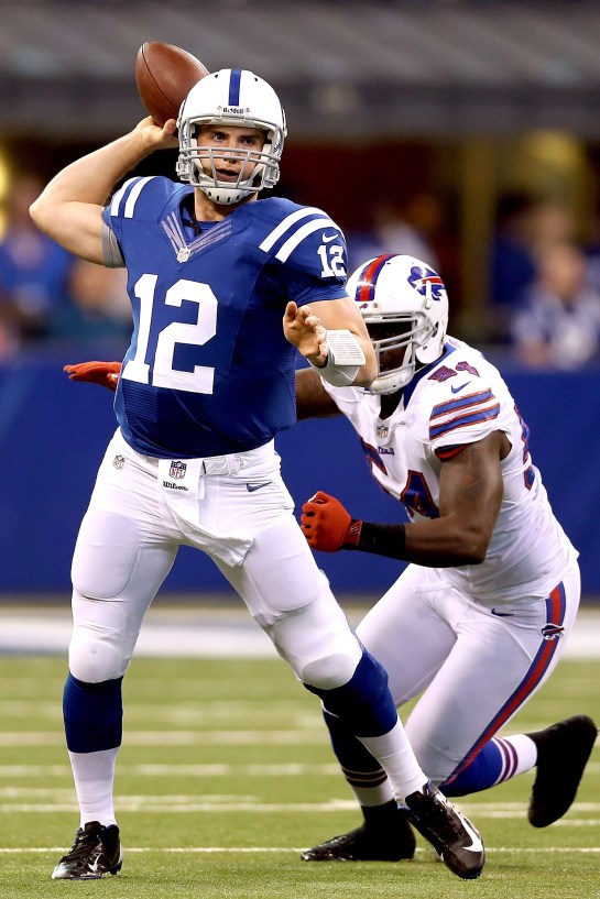Andrew Luck avoids Mario Williams and gets off a past vs. Buffalo.