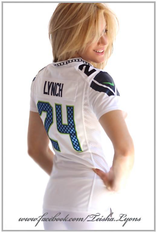 International fashion model Teisha Lyons looking lovely in a lady Seahawk jersey.
