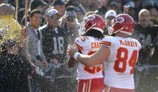 Cold beer thrown on him from Oakland fans couldn't cool down Jamaal Charles near record day.