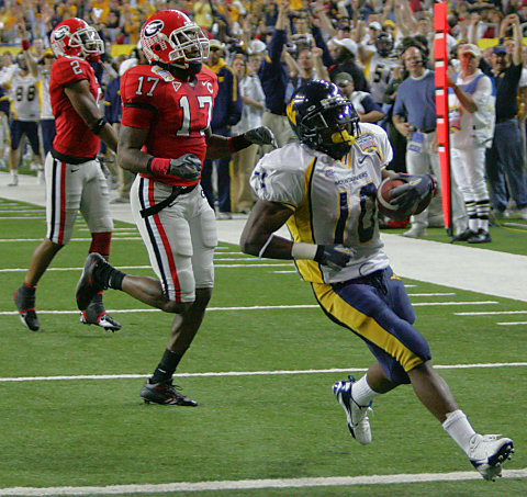 Steve Slaton killed Georgia with 202 yards and 3 touchdowns.