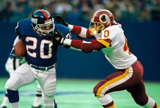 Morris stiff arms Alvin Walton in the 1986 NFC Championship Game